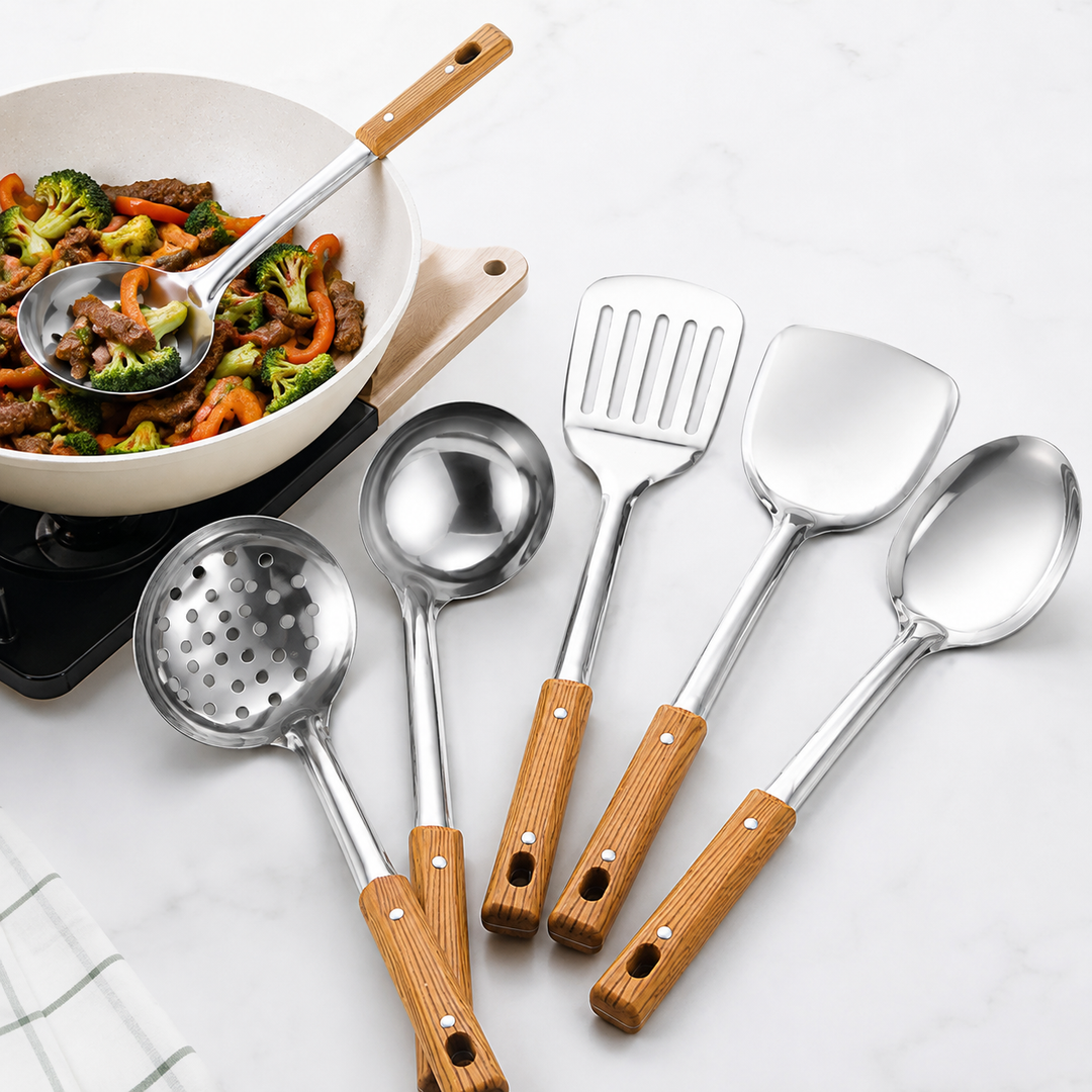 Slotted stainless steel turner spatula with ergonomic wooden handle Bowlift