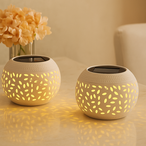 Solar-powered table lamp with punched pattern Bowlift