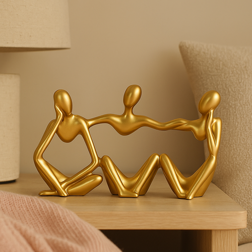Golden abstract thinker statues in unique artistic positions Bowlift