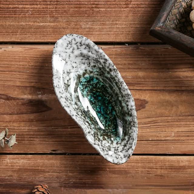 BowLift | Shell-shaped ceramic tableware for elegant occasions