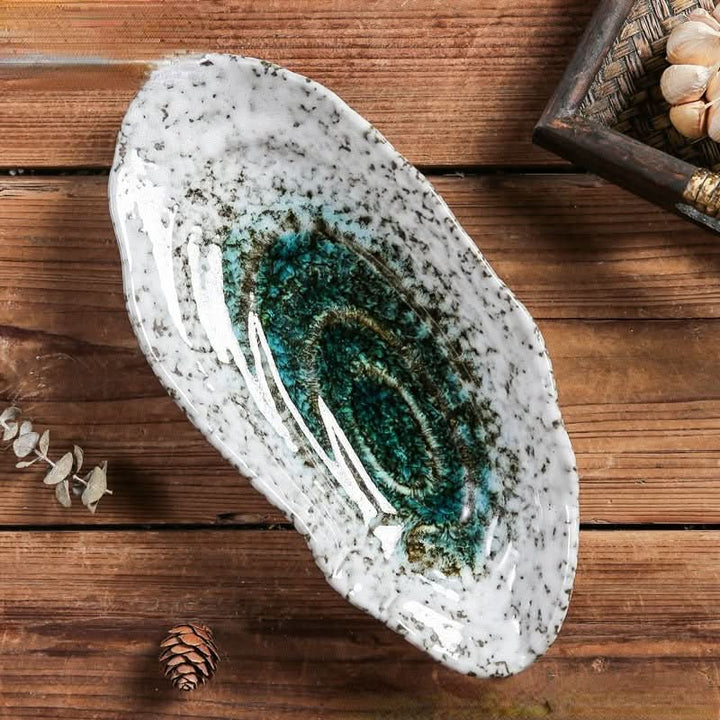 BowLift | Shell-shaped ceramic tableware for elegant occasions
