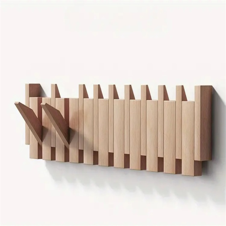 Wooden coat rack in piano design with foldable hooks | Bowlift