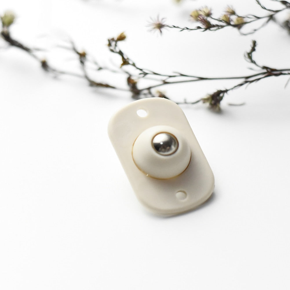 BowLift | Self-adhesive small furniture wheels