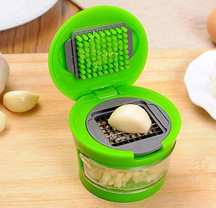 BowLift | Handy Garlic Press | The perfect press with reservoir