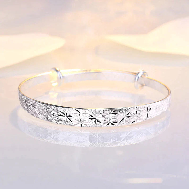 Enchanting Star-Shaped Silver Bracelet for a Radiant Look Bowlift