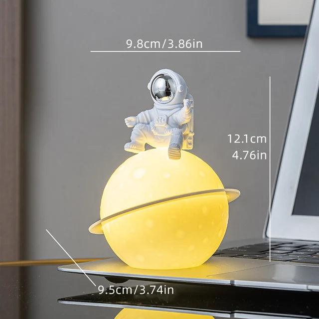 BowLift | AstroLume Astronaut Sculpture with Planet Night Light | Modern Decorative Highlight | Environmentally Friendly PVC & ABS | 9.8 x 12.1 cm