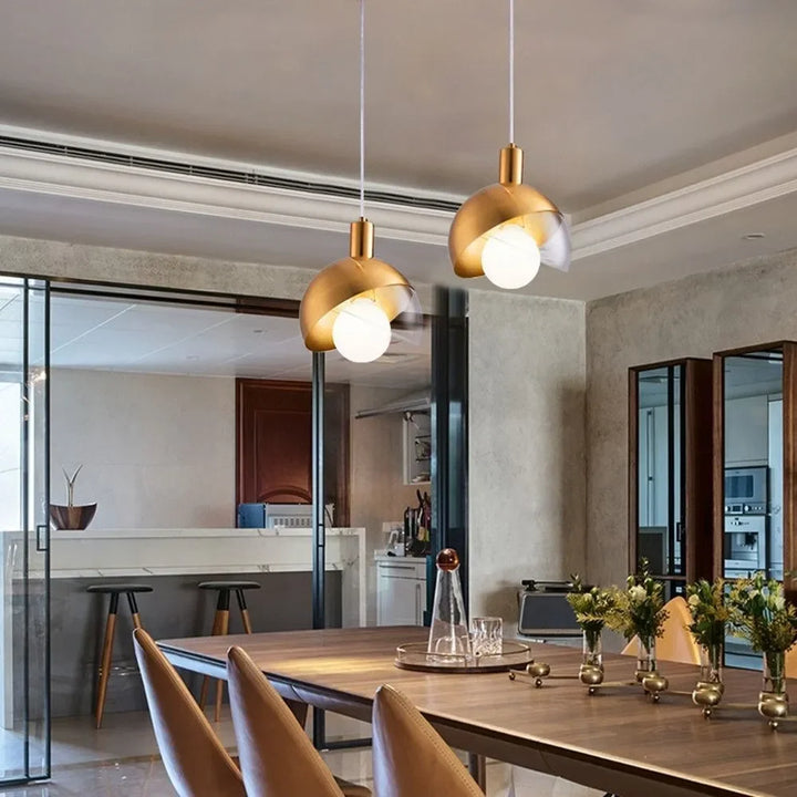 Modern golden pendant lights for dining room and kitchen, elegant design with ball lights | Bowlift