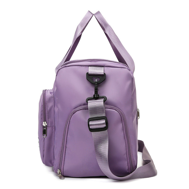 Travique Waterproof Sports and Travel Bag with Multiple Pockets | Bowlift