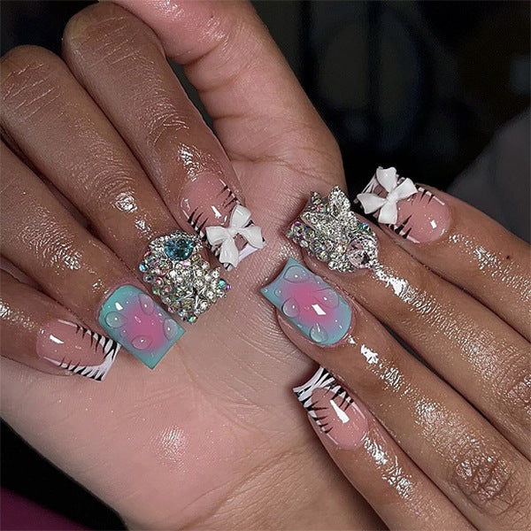 Artistic Nail Art with Glitter and 3D Details Bowlift