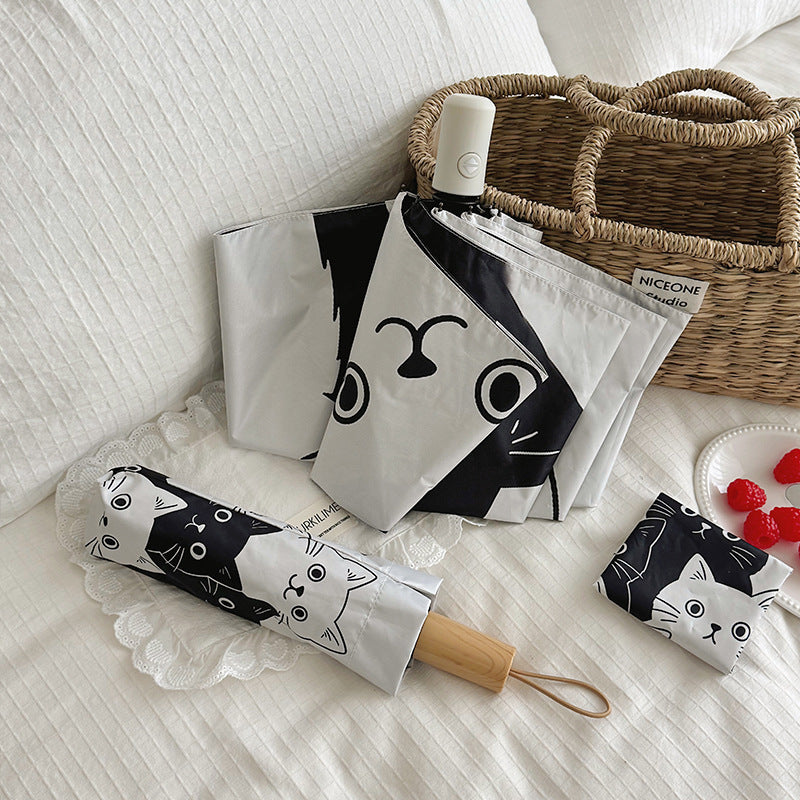 Women Folding Umbrella with Playful Cat Pattern Bowlift