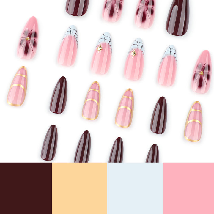 Artful Stiletto nails with gold accents and decorative floral designs Bowlift