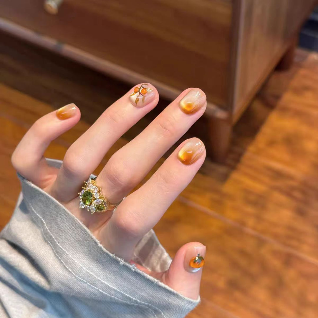 Artificial nails with elegant ombre effect and floral accents Bowlift