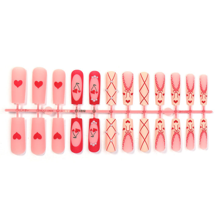 Art nail set with romantic heart and cherry motifs Bowlift