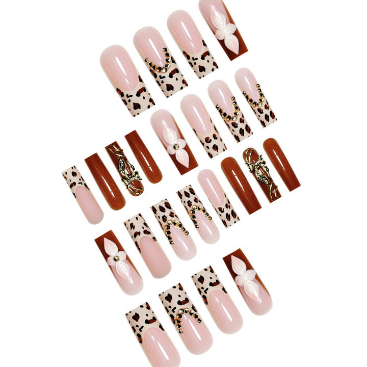 Artistic Long Press-On Nail Extensions with Elegant Floral Design Bowlift