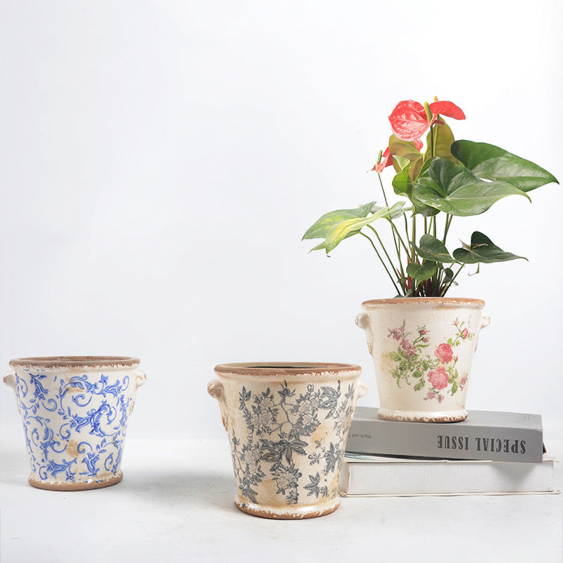 Decorative flower pot with floral embellishments Bowlift