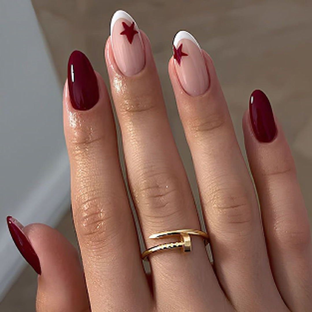Glamorous stiletto nails with elegant star design Bowlift