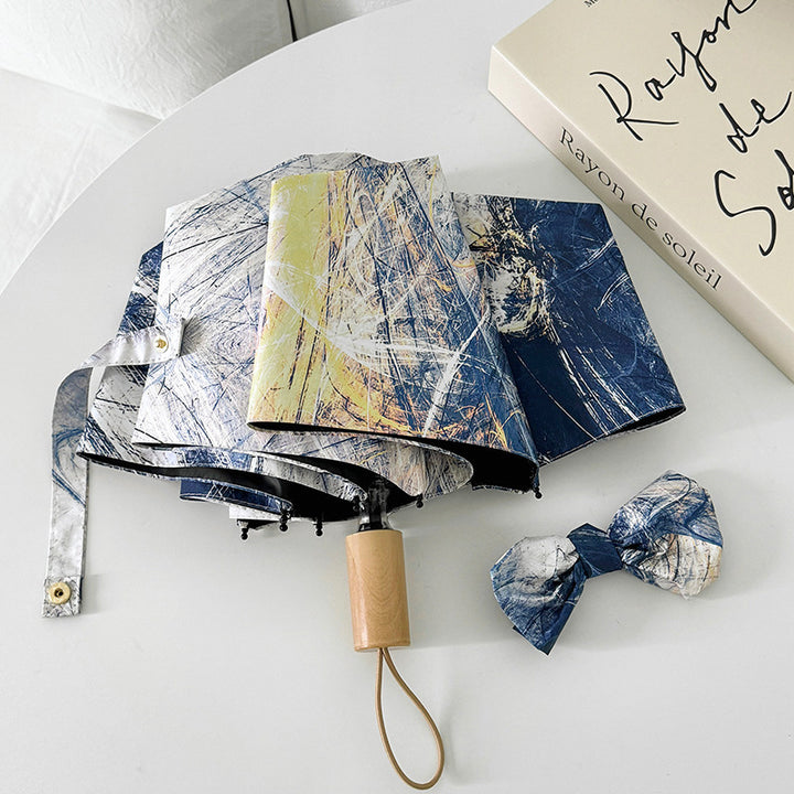 Ladies elegant folding umbrella with unique marble pattern Bowlift