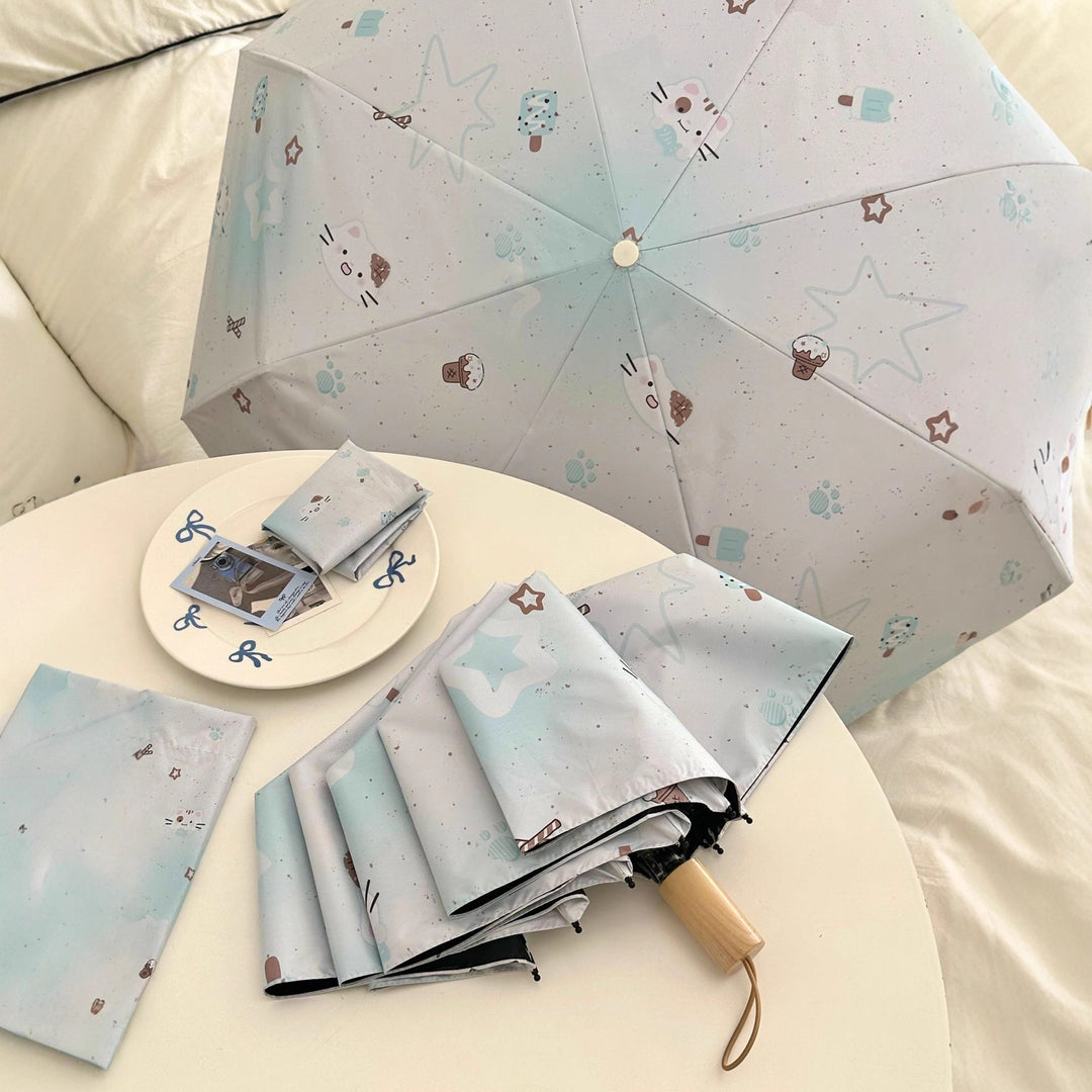 Women's compact folding umbrella with cute Bowlift motif
