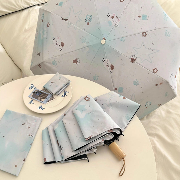 Women's compact folding umbrella with cute Bowlift motif