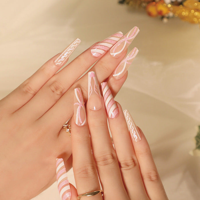 Artful Christmas nail art with original gingerbread motif Bowlift