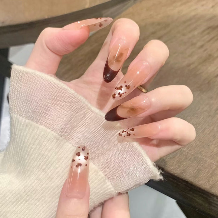 Artistic Stiletto Press-On Nails with Unique Animal Print Accents Bowlift