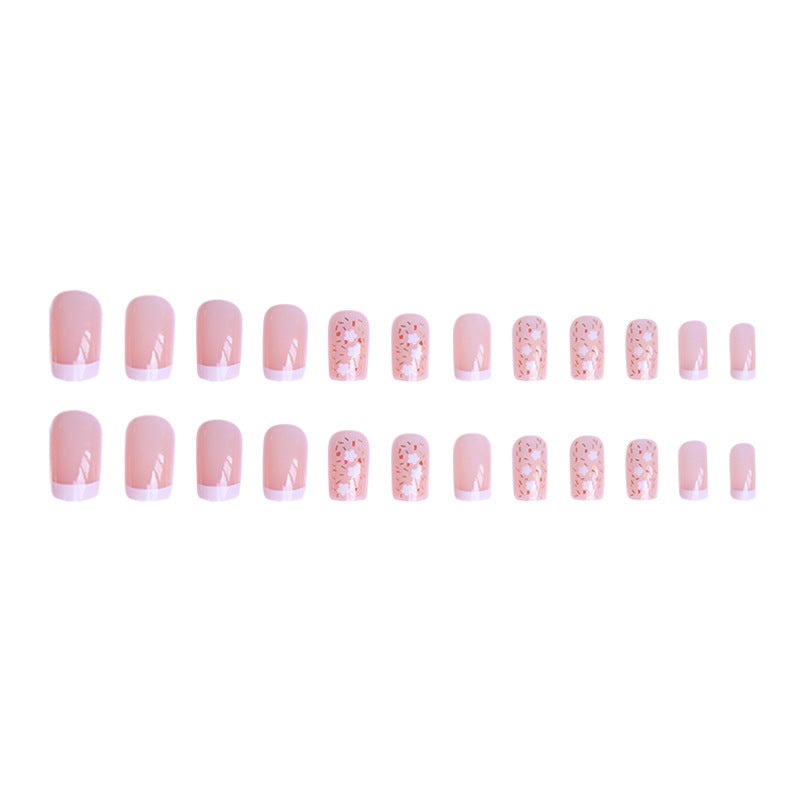 Nail art set with floral decorations and elegant French design Bowlift