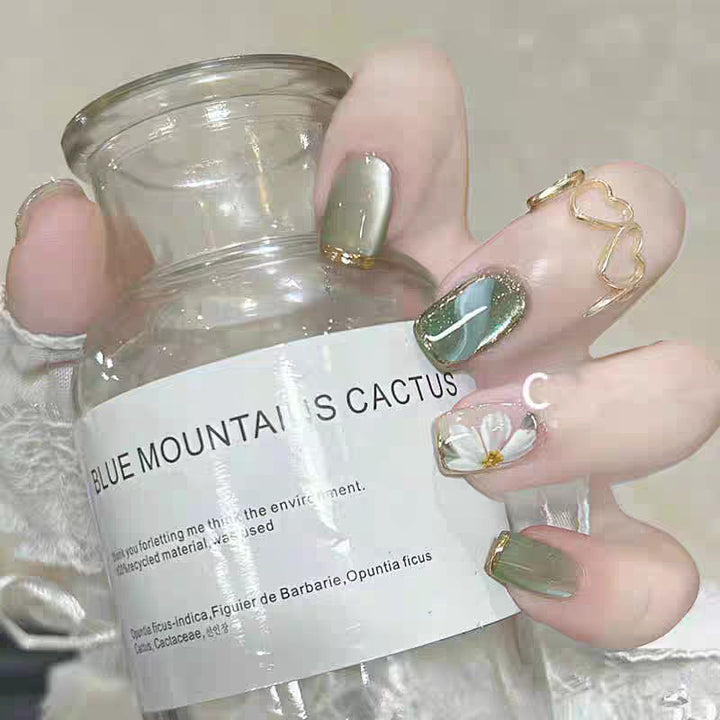 Artistic Press-On Nail Art Set with Decorative Floral and Gemstone Accents Bowlift