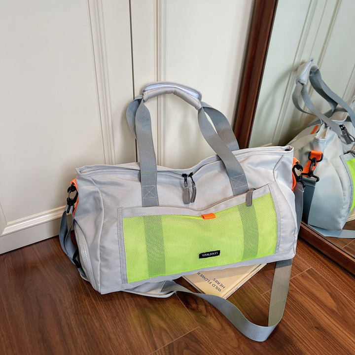 Sporty travel bag with mesh structure and practical compartments Bowlift