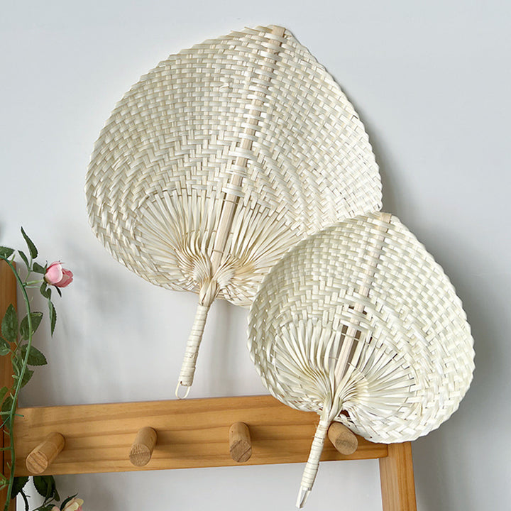 Women hand-woven fan made of natural material Bowlift