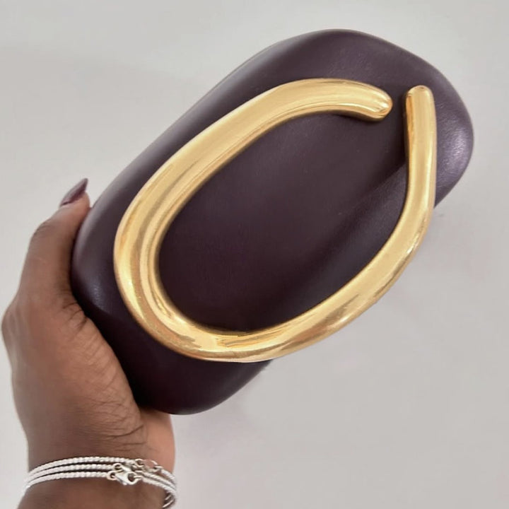 Statement Clutch with Sculptural Handle Bowlift