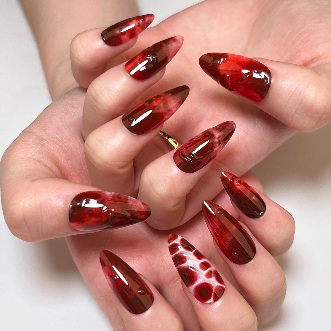 Artful stiletto nails in trendy design Bowlift