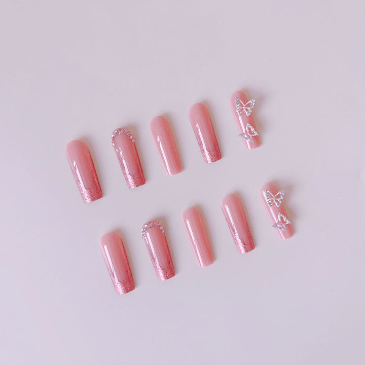 Nail set with sparkling glitter effects and elegant 3D decorations Bowlift