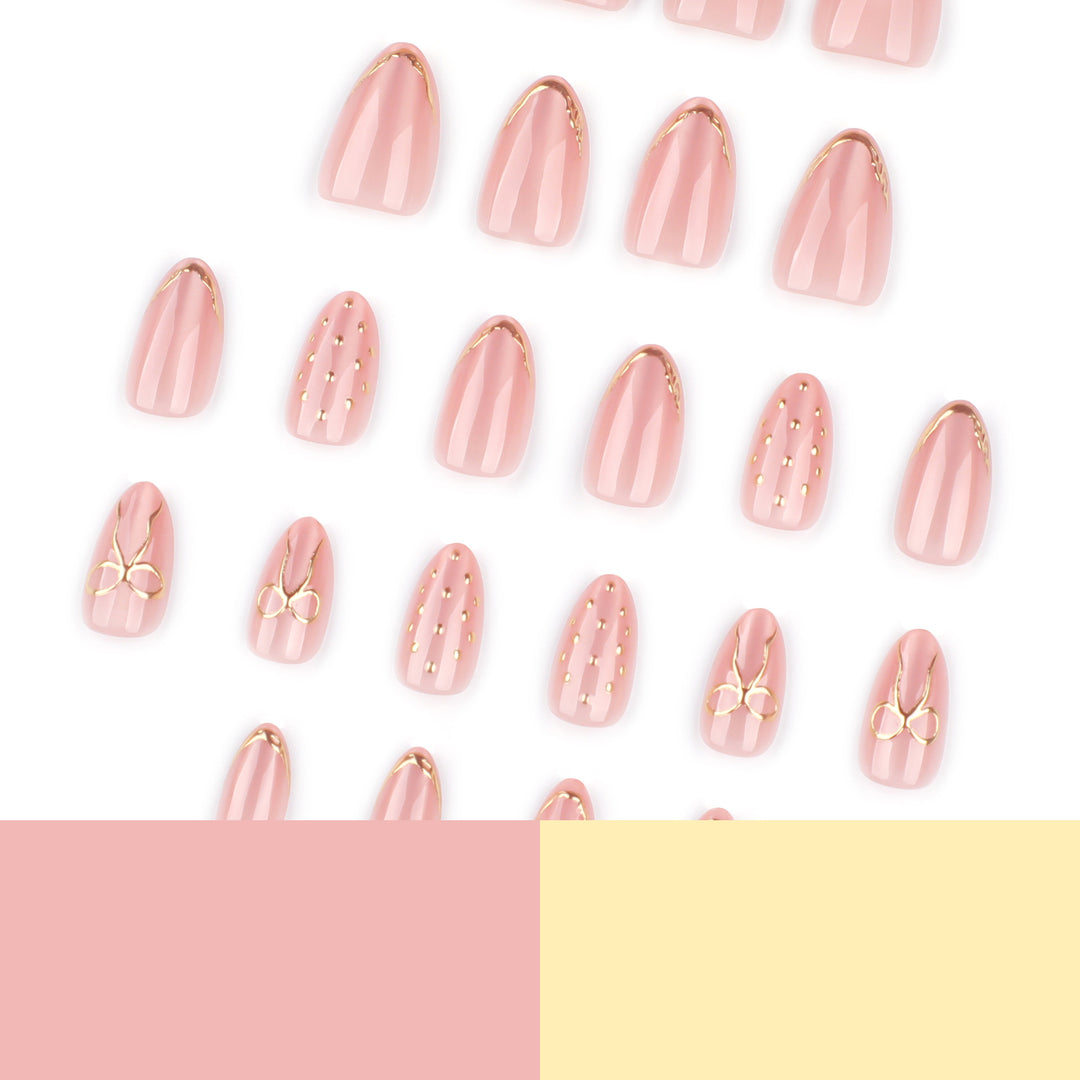 Artful nail extensions with elegant golden accents Bowlift