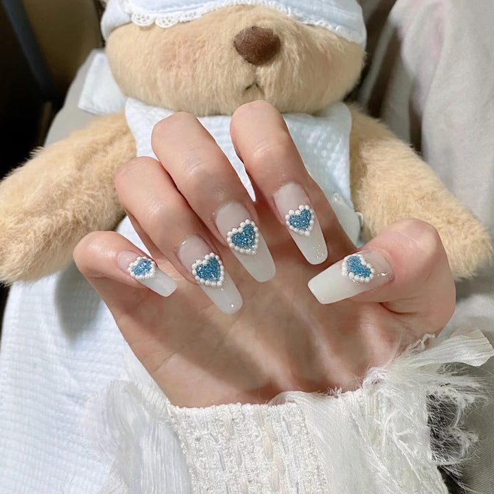 Artful nail art with heart-shaped accents Bowlift