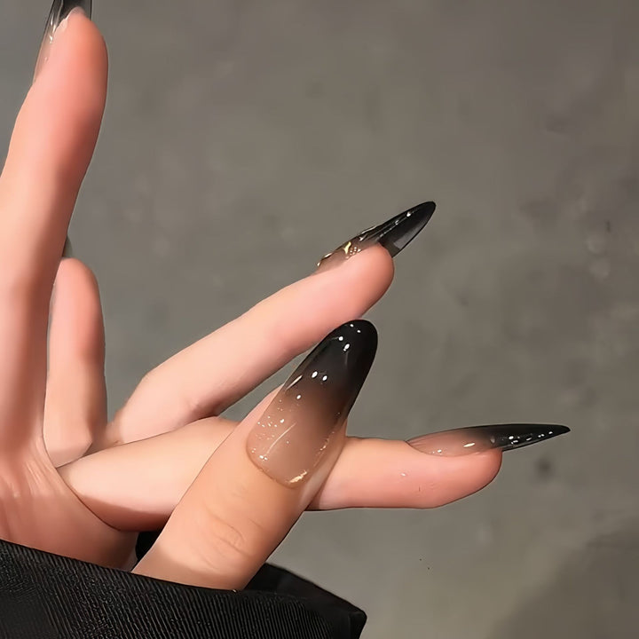 Glamorous artificial nails with intricate flower and glitter effects Bowlift