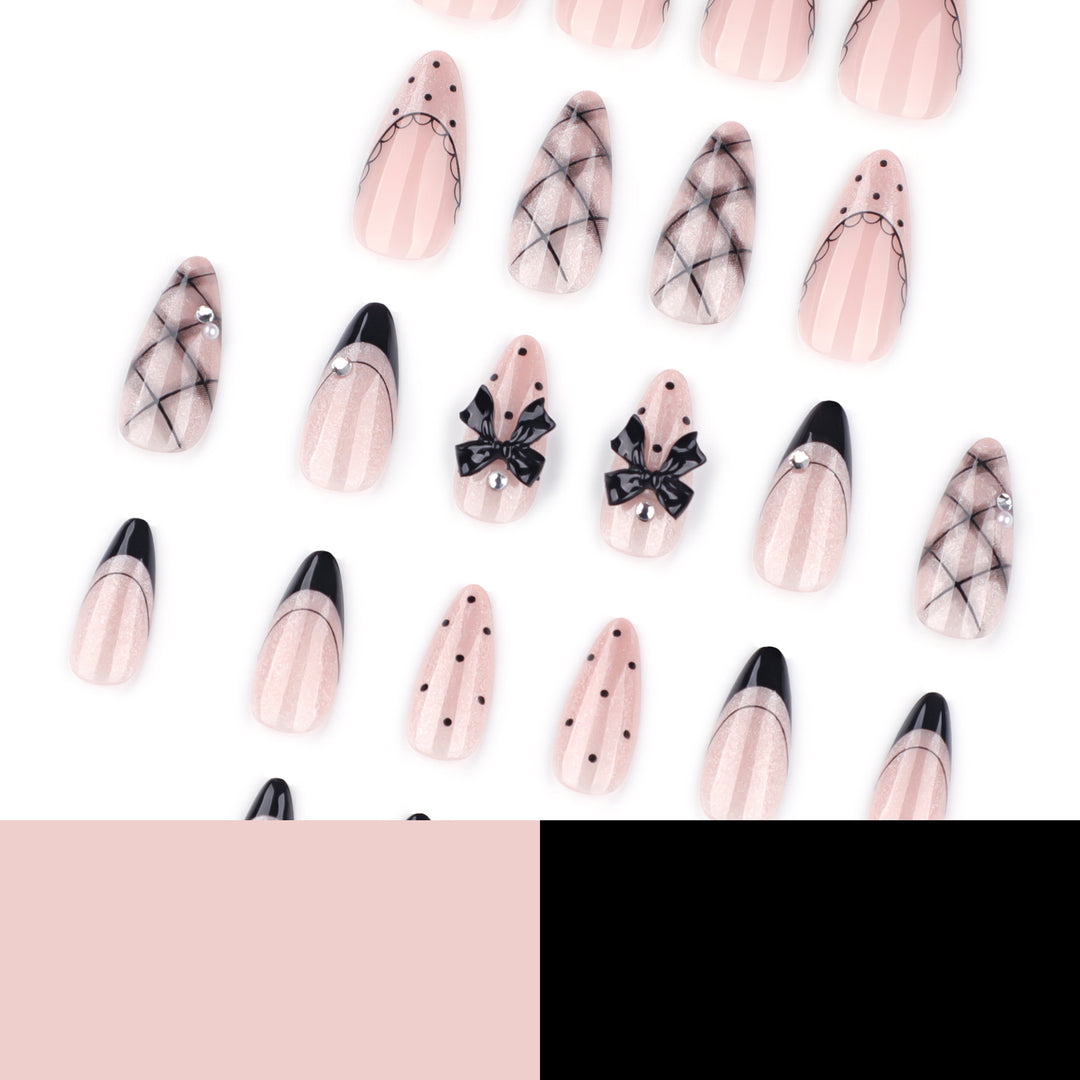 Artful Nail Art with Bow and Rhinestone Decorations Bowlift