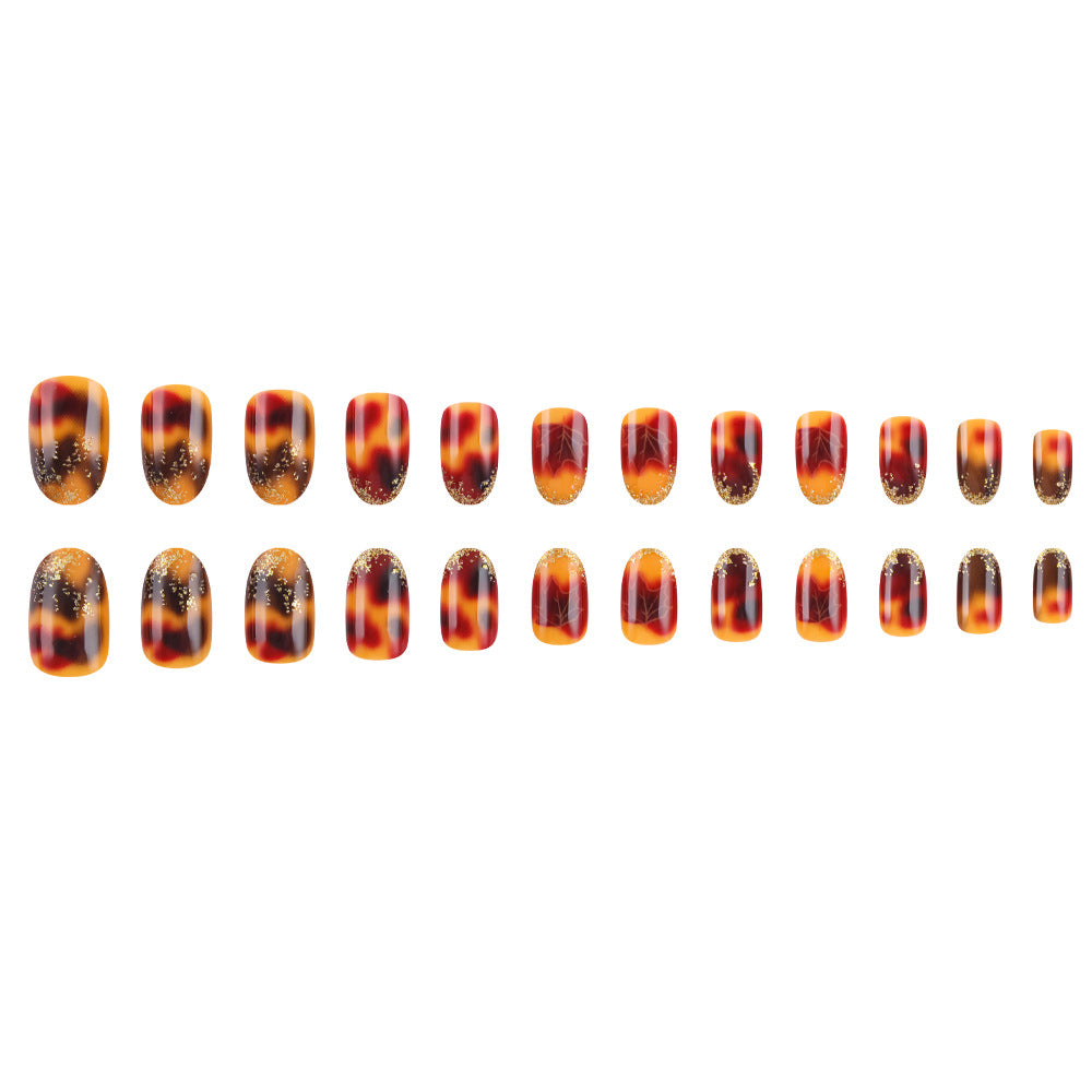 Artistic Press-On Nail Set with Autumn Leaf Design Bowlift
