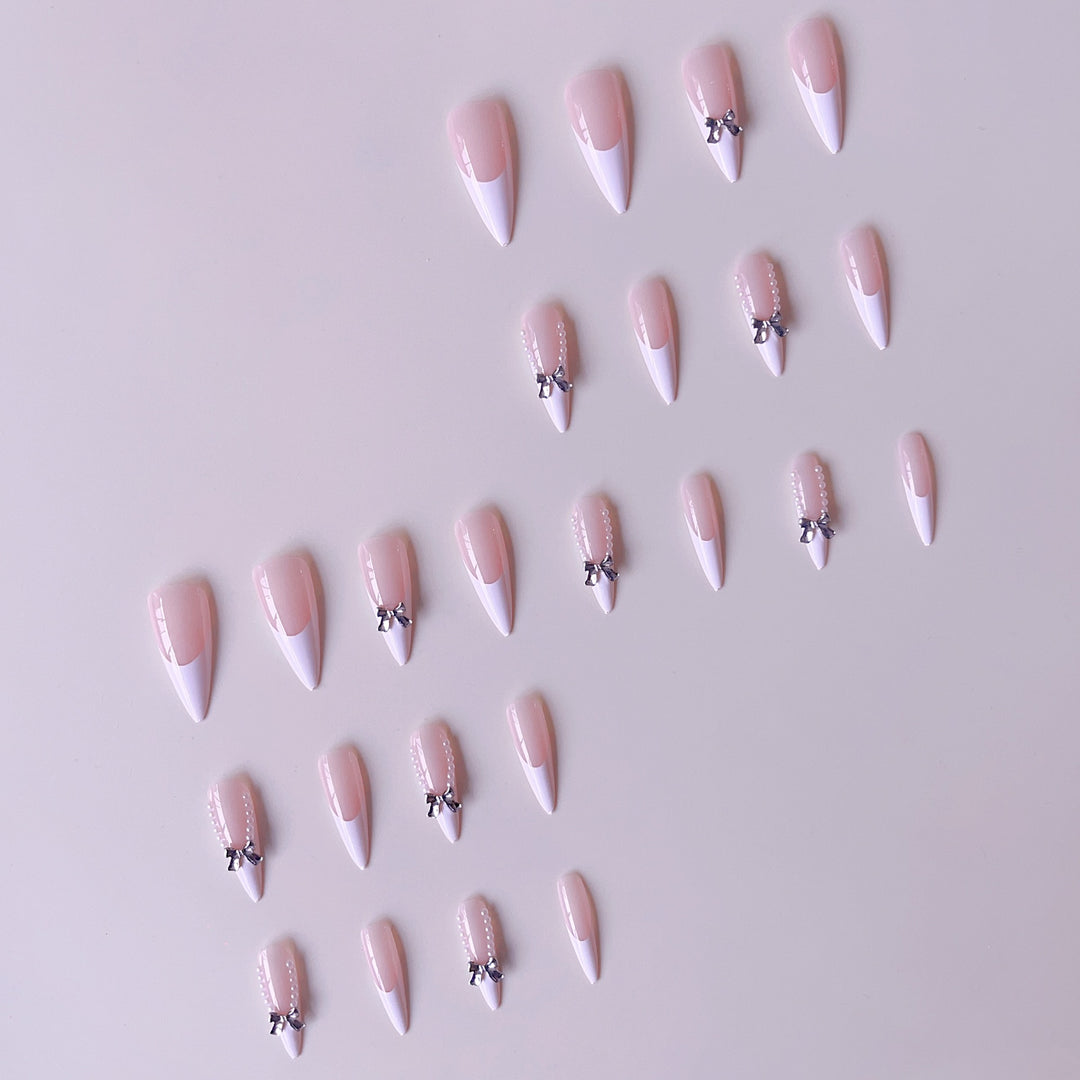 Elegant artificial nail set with 3D rhinestone details and pointed accents Bowlift