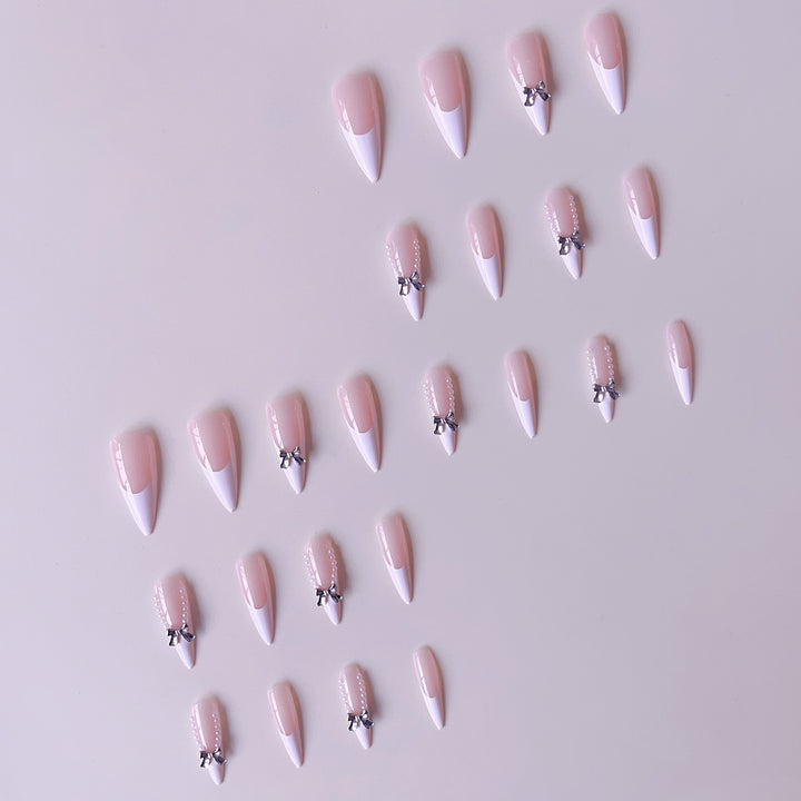 Elegant artificial nail set with 3D rhinestone details and pointed accents Bowlift