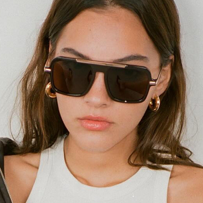 Women's square designer sunglasses with gold accents and protective UV filter Bowlift