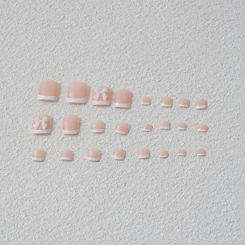 Artificial nail set with romantic bow motifs Bowlift