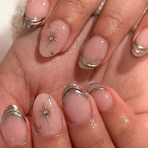 Glamorous nail extensions with elegant metallic accents Bowlift