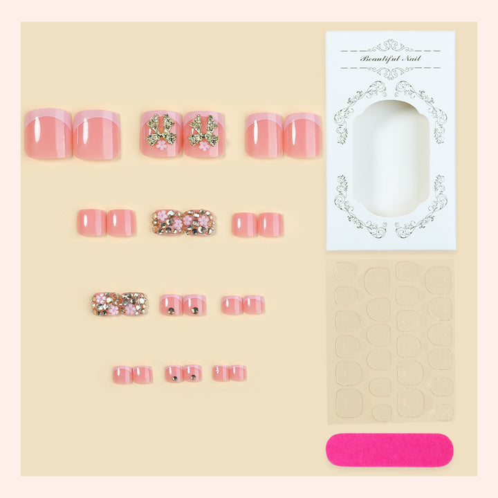 Artificial nail set with glamorous decorations and shimmering accents Bowlift