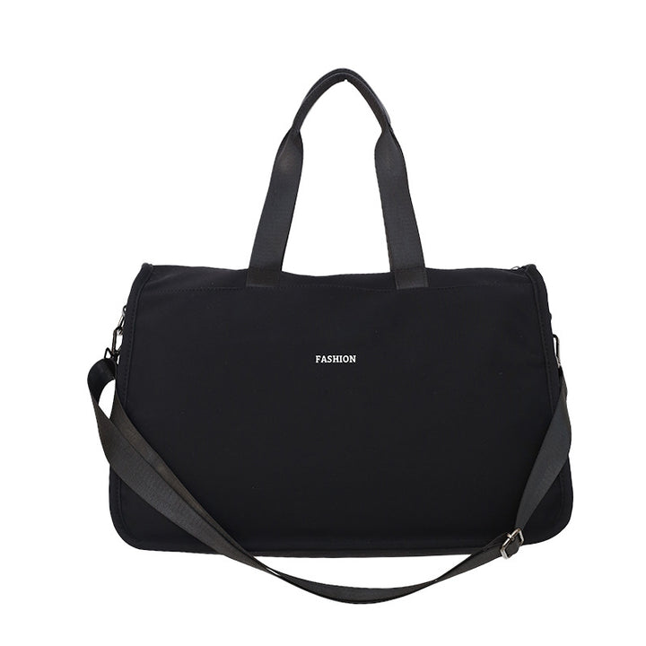 Sporty travel bag with ergonomic carrying handles and versatile compartments Bowlift