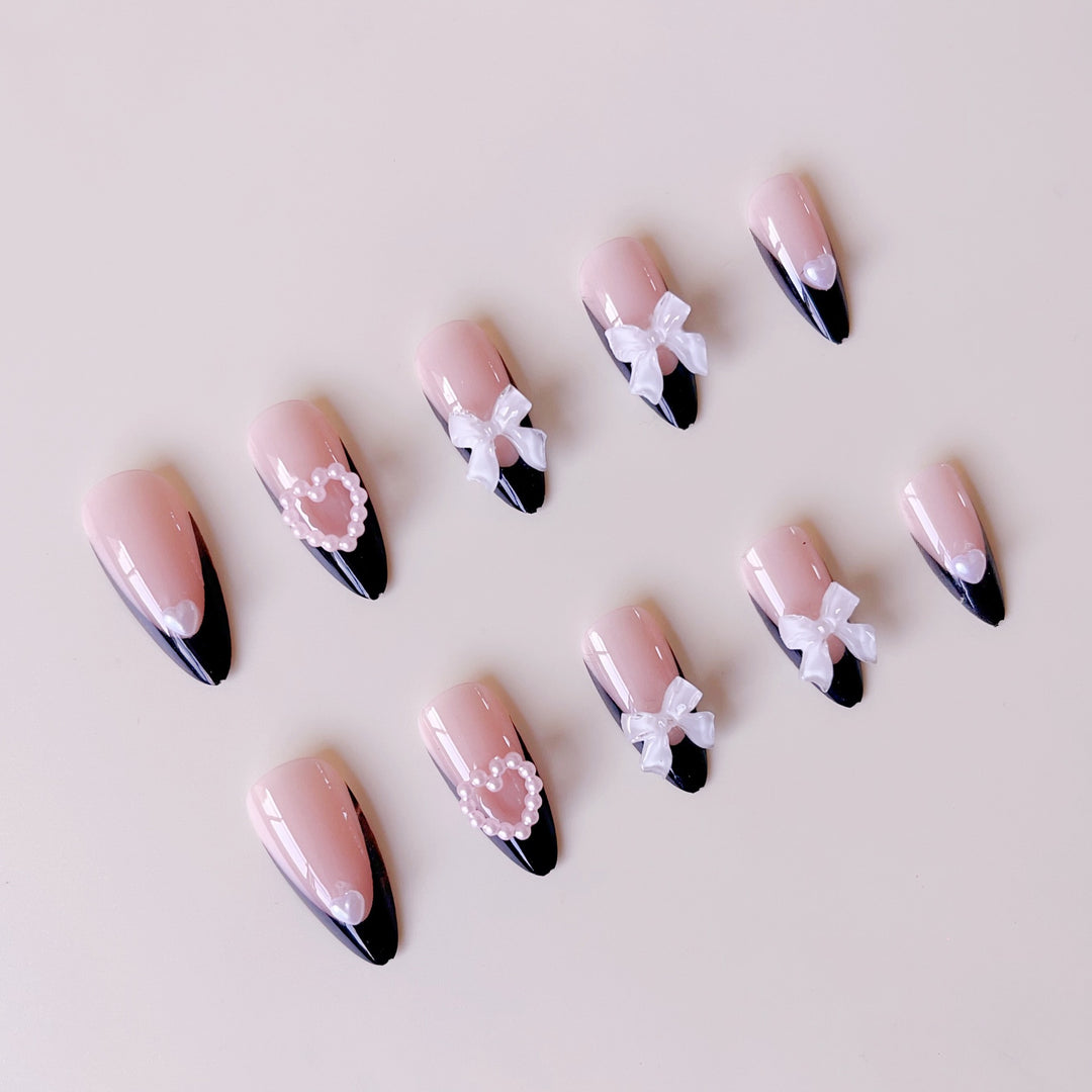 Glamorous artificial nail tips with 3D bows and heart decorations Bowlift
