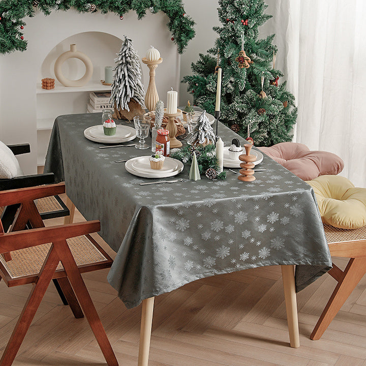 Jacquard tablecloth with intricate snowflake relief