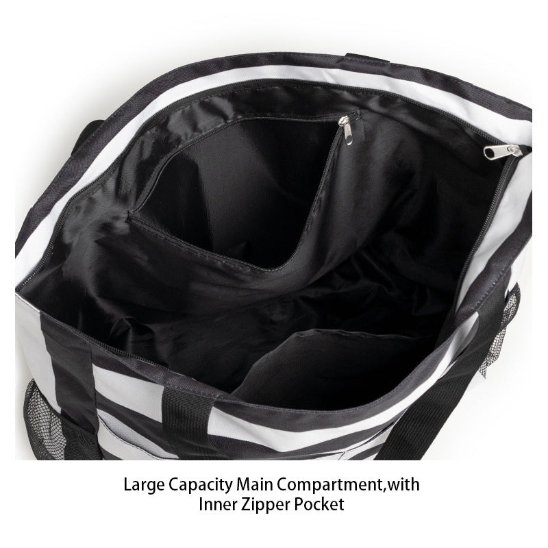 Spacious beach bag with practical outer pockets Bowlift
