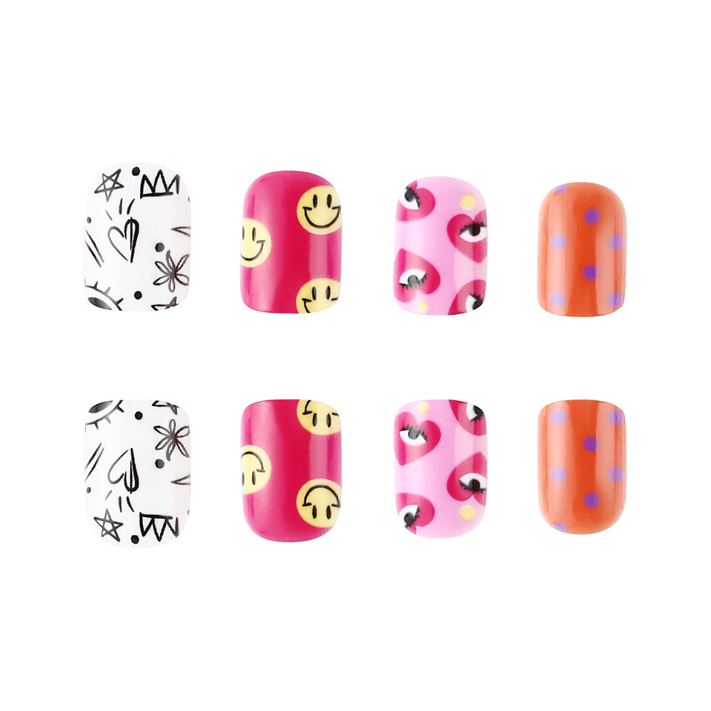 Artistic Press-On Nail Art Set with Playful Designs Bowlift