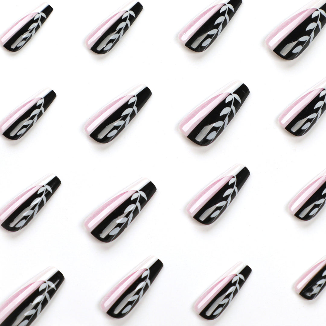 Artful nail extensions in elegant black and white design Bowlift