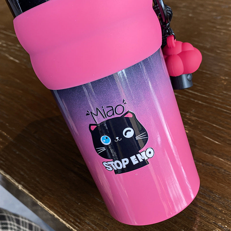 Women's playful coffee mug with silicone sleeve and integrated pendant Bowlift